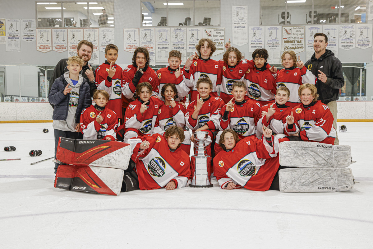 U15 Gold champions team photo with trophy