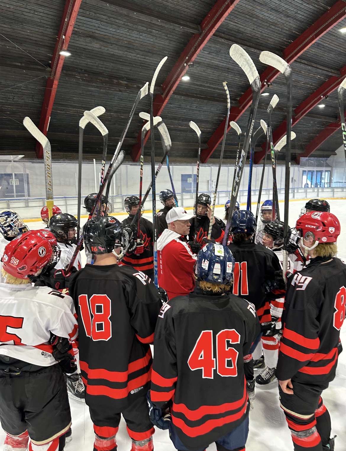 Sticks up team huddle
