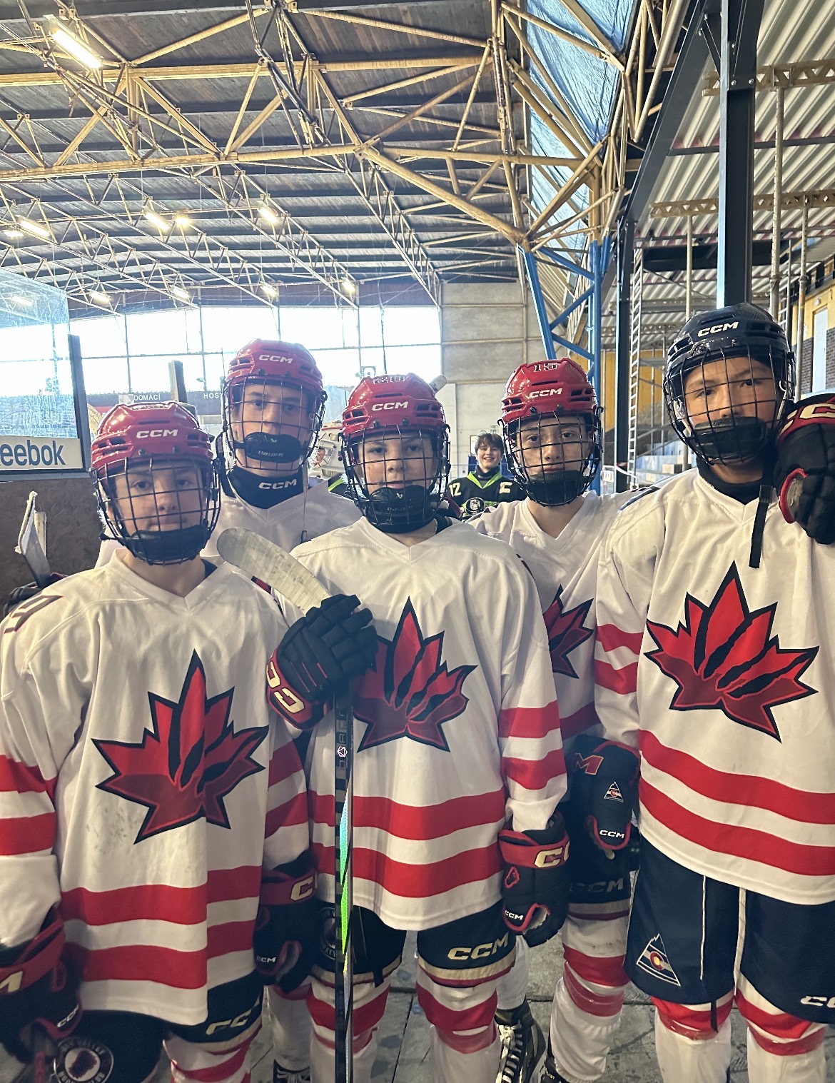 Players in Canada jerseys at European arena